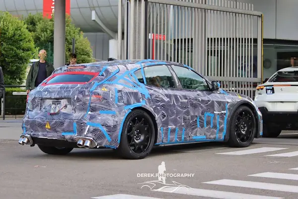 https___www.carscoops.com_wp-content_uploads_2024_06_Ferrari-EV-Mule-Scoop-3-1024x683